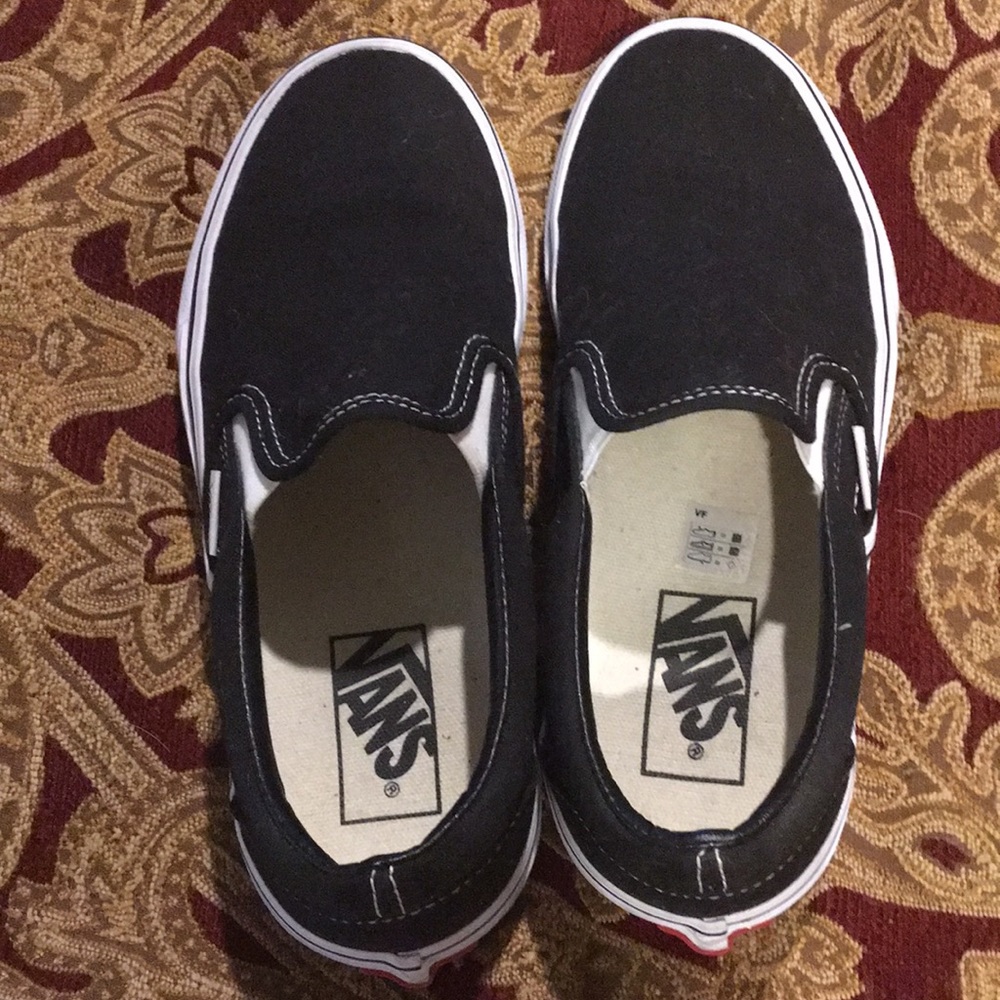 Women’s black slip on Vans. Like new